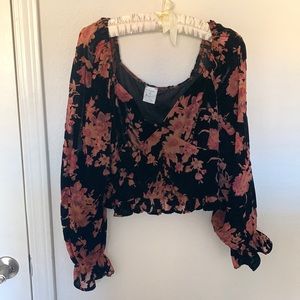 V-neck, puffy sleeve crop top that you could put off the shoulder from VICI